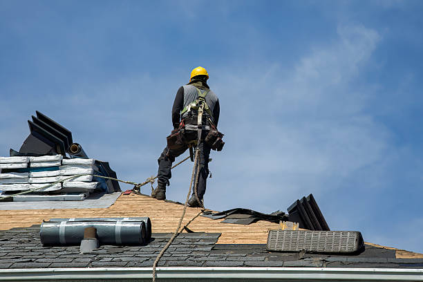 Professional Storm Damage Roof Repair technician working in Medina, TN